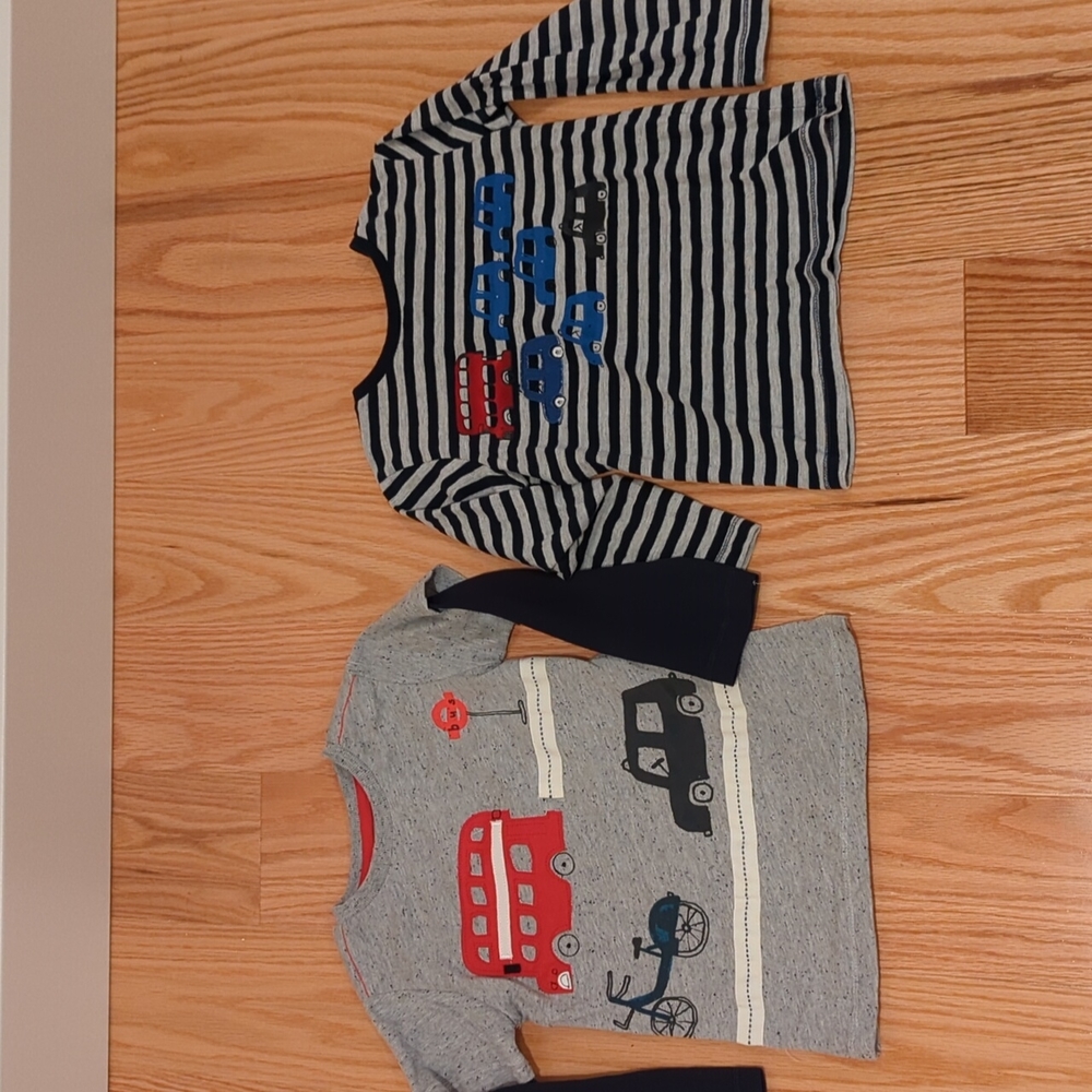 Two double decker bus shirts